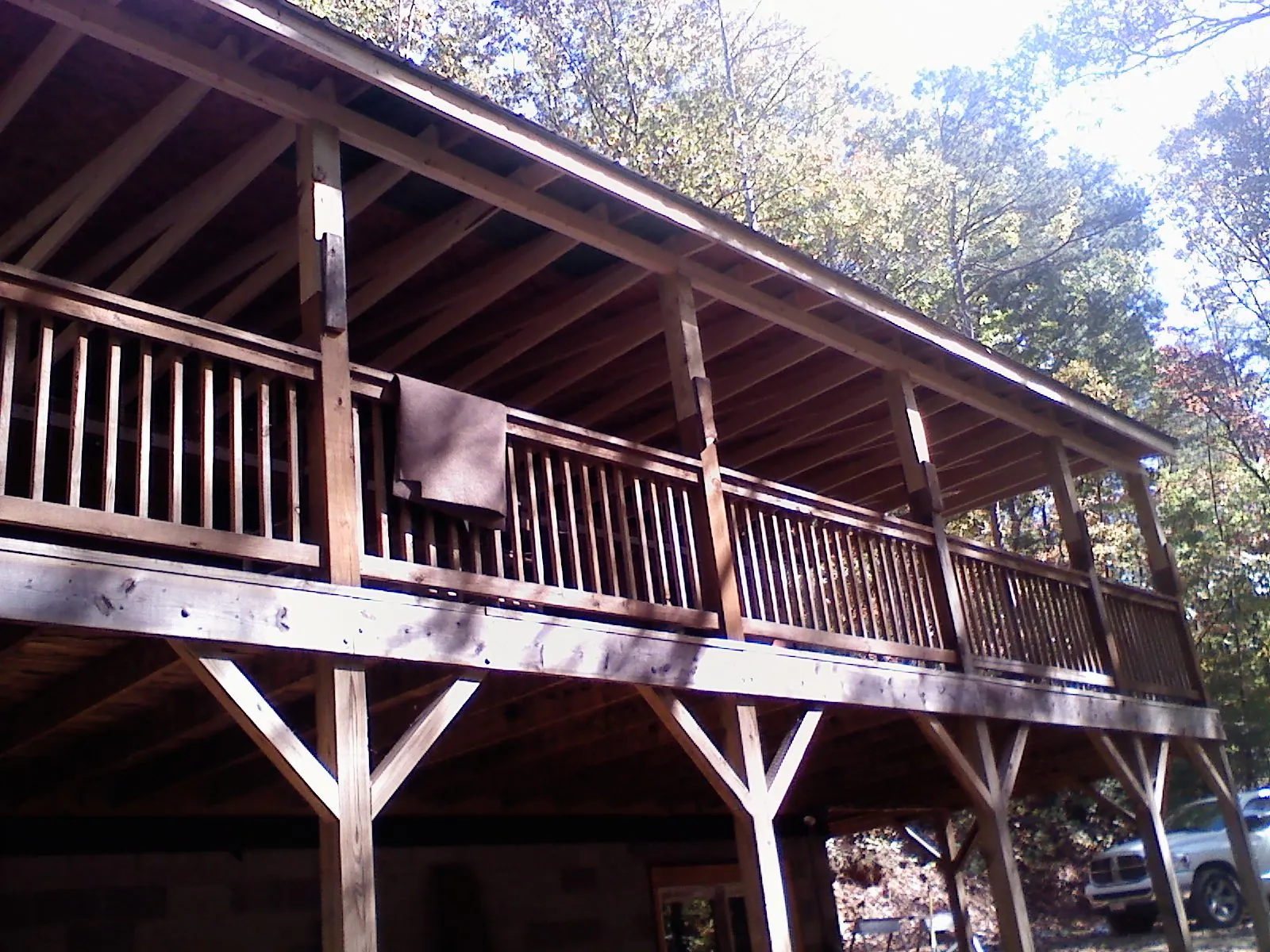 Timber framing under a new elevated porch and deck — Roof Leak Repair in Ratliff City by Roofing Brothers